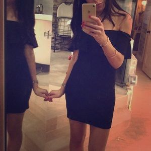 The reformation off shoulder ribbed black dress